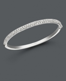 Add a hint of sparkle for an ultra-glam look. Eliot Danori's bangle bracelet features rows of sparkling crystal set in silver tone mixed metal. Approximate diameter: 2-1/4 inches. Add a hint of sparkle for an ultra-glam look. Eliot Danori's bangle bracelet features rows of sparkling crystal set in silver tone mixed metal. Approximate diameter: 2-1/4 inches.