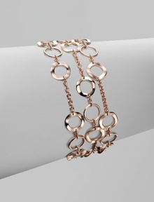 A beautifully crafted chain link punctuated with slim hammered circle links for a thoroughly modern look. 18k gold and sterling silver with 18k rose goldplatingLength, about 7½Fold-over clasp closureImported A beautifully crafted chain link punctuated with slim hammered circle links for a thoroughly modern look. 18k gold and sterling silver with 18k rose goldplatingLength, about 7½Fold-over clasp closureImported