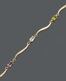 Let waves of sparkling color wash over your wrist. This multi stone bracelet features oval-cut white topaz (1/6 ct. t.w.), citrine (1/6 ct. t.w.), African amethyst (1/6 ct. t.w.), blue topaz (1/5 ct. t.w.), garnet (1/4 ct. t.w.), peridot (1/5 ct. t.w.) and diamond accents. Crafted in 18k gold over sterling silver. Approximate length: 7-1/4 inches. Let waves of sparkling color wash over your wrist. This multi stone bracelet features oval-cut white topaz (1/6 ct. t.w.), citrine (1/6 ct. t.w.), African amethyst (1/6 ct. t.w.), blue topaz (1/5 ct. t.w.), garnet (1/4 ct. t.w.), peridot (1/5 ct. t.w.) and diamond accents. Crafted in 18k gold over sterling silver. Approximate length: 7-1/4 inches.