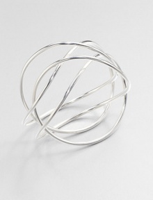 From the Alliance Collection. A sleek tube of sterling silver crisscrosses the wrist in this alluringly simple design by Allan Scharff.Sterling silverDiameter, about 3Width, about 3Imported From the Alliance Collection. A sleek tube of sterling silver crisscrosses the wrist in this alluringly simple design by Allan Scharff.Sterling silverDiameter, about 3Width, about 3Imported