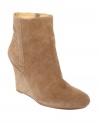 The sultry smooth upper of Nine West's Gottarun wedge booties makes them a certified pick for fall-time glamour.