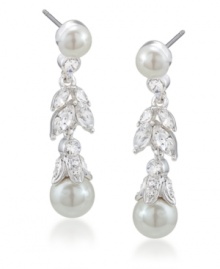 Feminine and fanciful. Add a ladylike look to your style with Carolee's floral linear drop earrings. Featuring luminous glass pearls and glittering glass accents, they're set in silver tone mixed metal. Approximate drop: 1-3/8 inches. Feminine and fanciful. Add a ladylike look to your style with Carolee's floral linear drop earrings. Featuring luminous glass pearls and glittering glass accents, they're set in silver tone mixed metal. Approximate drop: 1-3/8 inches.