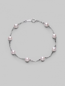 From the Akoya Collection. A delicate chain, sprinkled with lustrous white cultured Akoya pearls. 5mm white, round cultured pearls Quality: A+ 18k white gold Length, about 7 Spring ring clasp Imported From the Akoya Collection. A delicate chain, sprinkled with lustrous white cultured Akoya pearls. 5mm white, round cultured pearls Quality: A+ 18k white gold Length, about 7 Spring ring clasp Imported