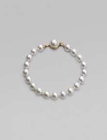 A single strand of round white pearls is an eternally elegant essential. 8mm white organic man-made pearls Length, about 7 18k goldplated sterling silver mabé pearl push-lock clasp Made in Spain A single strand of round white pearls is an eternally elegant essential. 8mm white organic man-made pearls Length, about 7 18k goldplated sterling silver mabé pearl push-lock clasp Made in Spain