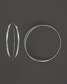Get flirty with Lana's 14K white gold hoops. With an endless closure and sleek front split, these earrings add just the right amount of shine to your style. Get flirty with Lana's 14K white gold hoops. With an endless closure and sleek front split, these earrings add just the right amount of shine to your style.