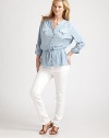 A simple button-down shirt offering you exquisite arm coverage, a comfortable, drawstring waist and a relaxed, undeniably flattering fit.Split collarRoll-tab sleevesFront pocketsButton frontDrawstring waistBack yokeAbout 26 from shoulder to hemCottonMachine washImported