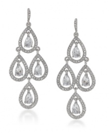 Channel romantic style in sparkling chandeliers. Carolee earrings feature a dramatic cut-out teardrop design accented by glittering glass stones. Crafted in silver tone mixed metal. Approximate drop: 2-5/8 inches. Channel romantic style in sparkling chandeliers. Carolee earrings feature a dramatic cut-out teardrop design accented by glittering glass stones. Crafted in silver tone mixed metal. Approximate drop: 2-5/8 inches.
