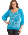 Look pretty in paisley with Style&co.'s three-quarter-sleeve plus size top, finished by a banded hem.