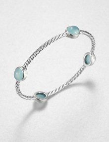From the Renaissance Collection. Let this beautiful piece take you back in time with cabochon aqua chalcedony stations on an iconic sterling silver cable design. Aqua chalcedonySterling silverDiameter, about 2.25Slip-on styleImported From the Renaissance Collection. Let this beautiful piece take you back in time with cabochon aqua chalcedony stations on an iconic sterling silver cable design. Aqua chalcedonySterling silverDiameter, about 2.25Slip-on styleImported