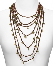 Discover your taste for exotic-chic with this layered necklace from Lauren by Ralph Lauren. Crafted from antiqued 14-karat gold plate, wood, and resin beads, it's sure to attract wandering eyes. Discover your taste for exotic-chic with this layered necklace from Lauren by Ralph Lauren. Crafted from antiqued 14-karat gold plate, wood, and resin beads, it's sure to attract wandering eyes.