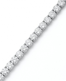 Match point. Arabella's stunning tennis bracelet combines dozens of round-cut Swarovski zirconias (31 ct. t.w.) in polished sterling silver. Approximate length: 7-1/2 inches. Match point. Arabella's stunning tennis bracelet combines dozens of round-cut Swarovski zirconias (31 ct. t.w.) in polished sterling silver. Approximate length: 7-1/2 inches.