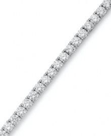 The perfect serve. Arabella's stunning tennis bracelet combines dozens of round-cut Swarovski zirconias (20-1/4 ct. t.w.) in polished sterling silver. Approximate length: 7 inches. The perfect serve. Arabella's stunning tennis bracelet combines dozens of round-cut Swarovski zirconias (20-1/4 ct. t.w.) in polished sterling silver. Approximate length: 7 inches.