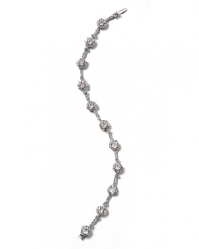 Glittering glamour is yours with Nadri's cubic zirconia and crystal framed bracelet. Perfect for holiday parties and events. Glittering glamour is yours with Nadri's cubic zirconia and crystal framed bracelet. Perfect for holiday parties and events.