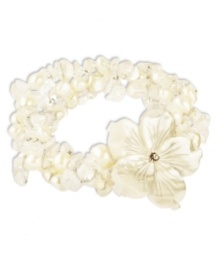 Prim petals. This pretty stretch bracelet combines three strands of cultured freshwater pearls (6-7 mm), white shells and cultured Mother of Pearl (46-3/4 mm) with a sweet flower accent. Set in sterling silver. Approximate length: 7-1/2 inches. Approximate diameter: 2 inches. Prim petals. This pretty stretch bracelet combines three strands of cultured freshwater pearls (6-7 mm), white shells and cultured Mother of Pearl (46-3/4 mm) with a sweet flower accent. Set in sterling silver. Approximate length: 7-1/2 inches. Approximate diameter: 2 inches.
