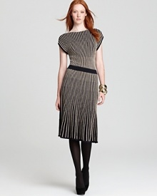 Cozy up to this softly-knit MARC BY MARC JACOBS sweater dress--energized with bold metallic stripes for perfectly-placed pops of shine. Cozy up to this softly-knit MARC BY MARC JACOBS sweater dress--energized with bold metallic stripes for perfectly-placed pops of shine.