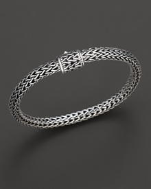 Small sterling woven chain bracelet with carved chain clasp, designed by John Hardy. Small sterling woven chain bracelet with carved chain clasp, designed by John Hardy.