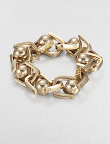 A visual pun on a vintage phrase, bold links and smooth beads alternate in this striking design.BrassLength, about 7.5Width, about .75Fold-over claspImported A visual pun on a vintage phrase, bold links and smooth beads alternate in this striking design.BrassLength, about 7.5Width, about .75Fold-over claspImported