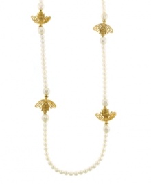This style is sweet as honey. 2028's vintage-themed long strand necklace features ivory-colored acrylic pearls and intricate bumblebee charms. Crafted in gold-plated mixed metal. Approximate length: 48 inches. This style is sweet as honey. 2028's vintage-themed long strand necklace features ivory-colored acrylic pearls and intricate bumblebee charms. Crafted in gold-plated mixed metal. Approximate length: 48 inches.