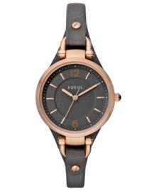 A thin leather strap holds a rosy-hued case on this unique Georgia collection watch by Fossil. A thin leather strap holds a rosy-hued case on this unique Georgia collection watch by Fossil.