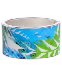 Infuse your look with the bold colors and exotic prints of Brasil. Crafted in silver tone mixed metal Haskell's Palm bangle features blue and green palm leaf details with a hinge clasp. Approximate diameter: 2-1/2 inches. Approximate length: 8 inches. Item comes packaged in green gift box. Infuse your look with the bold colors and exotic prints of Brasil. Crafted in silver tone mixed metal Haskell's Palm bangle features blue and green palm leaf details with a hinge clasp. Approximate diameter: 2-1/2 inches. Approximate length: 8 inches. Item comes packaged in green gift box.