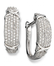 A style essential with extra sparkle -- a must have for every girl likes to shine. This perfect pair of hoop earrings features a dazzling array of round-cut diamonds (1 ct. t.w.). Crafted in sterling silver. Approximate diameter: 1 inch. A style essential with extra sparkle -- a must have for every girl likes to shine. This perfect pair of hoop earrings features a dazzling array of round-cut diamonds (1 ct. t.w.). Crafted in sterling silver. Approximate diameter: 1 inch.