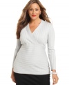 Dress up your casual look with Style&co.'s long sleeve plus size sweater, showcasing a metallic finish.