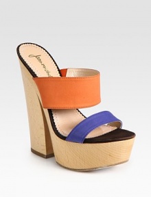 Modernize your wardrobe with this leather platform design, equipped with vibrant colorblocked straps and a wooden heel. Wooden heel, 6 (150mm)Wooden platform, 1½ (40mm)Compares to a 4½ heel (115mm)Leather upperLeather lining and solePadded insoleImported Modernize your wardrobe with this leather platform design, equipped with vibrant colorblocked straps and a wooden heel. Wooden heel, 6 (150mm)Wooden platform, 1½ (40mm)Compares to a 4½ heel (115mm)Leather upperLeather lining and solePadded insoleImported