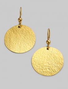 Richly textured discs of hammered 24k gold swing from graceful golden beads. 24k yellow gold Diameter, about 1 Ear wire Imported