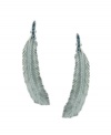 Totally trendy. Feathers are very much in fashion at the moment, and BCBGeneration intreprets them as a chic pair of earrings. Adorned with black glass accents near the post, they're set in silver tone mixed metal. Approximate drop: 2-1/4 inches.