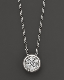 A stunning diamond cluster is bezel-set in 14K white gold. A stunning diamond cluster is bezel-set in 14K white gold.