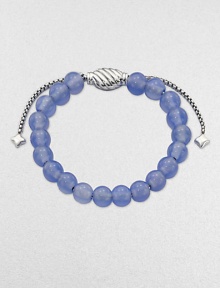 From the Spiritual Bead Collection. A simple strand of softly hued 8mm blue chalcedony beads on a sterling silver chain with an oval cable slide clasp.Blue chalcedonySterling silverDiameter, about 2Adjustable slide claspImported From the Spiritual Bead Collection. A simple strand of softly hued 8mm blue chalcedony beads on a sterling silver chain with an oval cable slide clasp.Blue chalcedonySterling silverDiameter, about 2Adjustable slide claspImported