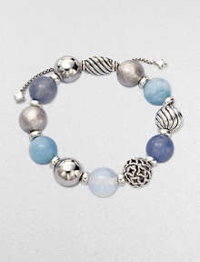From the Elements Collection. Rich textures and soft shades combine in a stunning strand of 14mm sterling silver, blue chalcedony, aquamarine and moon quartz beads with a silver oval slide clasp.Blue chalcedony, aquamarine and moon quartzSterling silverDiameter, about 2Adjustable slide claspImported From the Elements Collection. Rich textures and soft shades combine in a stunning strand of 14mm sterling silver, blue chalcedony, aquamarine and moon quartz beads with a silver oval slide clasp.Blue chalcedony, aquamarine and moon quartzSterling silverDiameter, about 2Adjustable slide claspImported