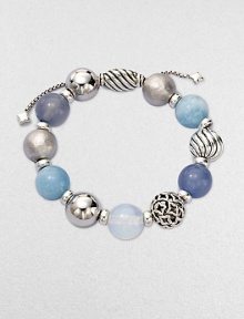 From the Elements Collection. Rich textures and soft shades combine in a stunning strand of 14mm sterling silver, blue chalcedony, aquamarine and moon quartz beads with a silver oval slide clasp.Blue chalcedony, aquamarine and moon quartzSterling silverDiameter, about 2Adjustable slide claspImported