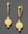 Have a ball with these spectacular earrings featuring laser-cut beads crafted in 14k gold. Approximate drop: 1 inch.