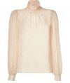Give your office look and impossibly feminine finish with Tara Jarmons sheer silk top, perfect for pairing with sharply cut pencil skirts and peep-toe pumps - Stand-up collar with button closures, long sleeves, buttoned cuffs, key-hole cut-out at nape, gathered detailing throughout - Wear to work with tailored separates and jet black accessories