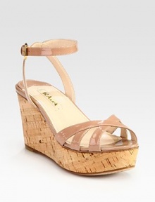 Patent leather adjustable ankle strap design with a cork wedge. Cork wedge, 3 (75mm)Cork platform, 1 (25mm)Compares to a 2 heel (50mm)Patent leather upperLeather lining and solePadded insoleMade in ItalyOUR FIT MODEL RECOMMENDS ordering true size. Patent leather adjustable ankle strap design with a cork wedge. Cork wedge, 3 (75mm)Cork platform, 1 (25mm)Compares to a 2 heel (50mm)Patent leather upperLeather lining and solePadded insoleMade in ItalyOUR FIT MODEL RECOMMENDS ordering true size.