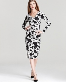 Cut from supple silk jersey and emblazoned with a graphic chain pattern, this formfitting DIANE von FURSTENBERG dress drapes gorgeously on the frame. Cut from supple silk jersey and emblazoned with a graphic chain pattern, this formfitting DIANE von FURSTENBERG dress drapes gorgeously on the frame.