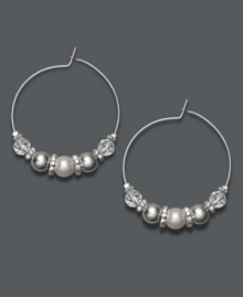 Traditional hoops with a frosty edge. Charter Club earrings feature a silver tone mixed metal hoop setting decorated with white simulated pearls and faceted plastic beads. Approximate diameter: 1-1/2 inches. Traditional hoops with a frosty edge. Charter Club earrings feature a silver tone mixed metal hoop setting decorated with white simulated pearls and faceted plastic beads. Approximate diameter: 1-1/2 inches.