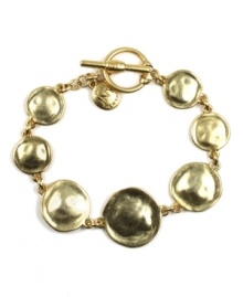 Encircle your wrists in style that stands out. Bracelet by Jones New York features a chic, circular design and toggle clasp. Crafted in gold tone mixed metal. Approximate length: 7-3/4 inches. Encircle your wrists in style that stands out. Bracelet by Jones New York features a chic, circular design and toggle clasp. Crafted in gold tone mixed metal. Approximate length: 7-3/4 inches.