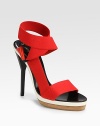 Sleek leather silhouette topped with comfy-cool elastic straps that weave their way around the ankle. Self-covered heel, 5 (125mm)Covered platform, ¾ (20mm)Compares to a 4¼ heel (110mm)Elastic upperLeather liningBuffed leather solePadded insoleMade in ItalyOUR FIT MODEL RECOMMENDS ordering one size up as this style runs small. 