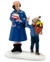 Ralphie tries his hand at bribery, presenting Miss Shields with an entire fruit basket instead of an apple in this humorous figurine from A Christmas Story Village. By Department 56.