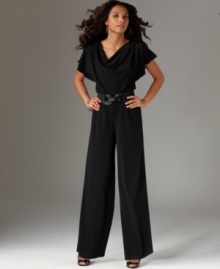 This breezy, well-draped jumpsuit by AGB features a relaxed stretch fit, a tall inseam and a nipped-in belted waist for a feminine silhouette. This breezy, well-draped jumpsuit by AGB features a relaxed stretch fit, a tall inseam and a nipped-in belted waist for a feminine silhouette.