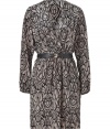 With its cool tribal print and breezy silk silhouette, Akikos wrap dress guarantees a contemporary, feminine edge to your outfit - Wrapped V-neckline, long sleeves, gathered elasticized cuffs and waistline, side slit pockets, metal detailed belt with elasticized strap and front hook closure, pull-over style - Softly draped fit - Wear with heels and sparkly jewelry for cocktails