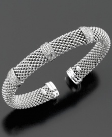 Part of the stylish Dewdrop collection, this diamond bracelet features round-cut diamond (1/3 ct. t.w.) set in sterling silver. Stretches to fit wrist. Approximate diameter: 2-1/4 inches. Part of the stylish Dewdrop collection, this diamond bracelet features round-cut diamond (1/3 ct. t.w.) set in sterling silver. Stretches to fit wrist. Approximate diameter: 2-1/4 inches.