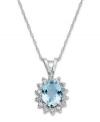 Royally stunning. This gorgeous pendant necklace features an oval-cut aquamarine (1-1/10 ct. t.w.) surrounded by a halo of round-cut diamonds (1/10 ct. t.w.). Crafted in 14k white gold. Approximate length: 18 inches. Approximate drop: 3/4 inch.