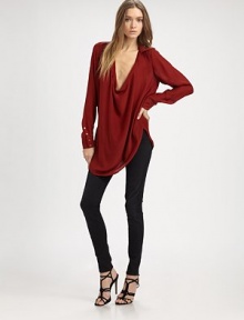 A relaxed silk style made sexy with a deep cowl neckline.Point collar Long sleeves with button cuffs Shirttail hem Back yoke with shirring About 29 from shoulder to hem Silk Dry clean ImportedModel shown is 5'9 (175cm) wearing US size Small. A relaxed silk style made sexy with a deep cowl neckline.Point collar Long sleeves with button cuffs Shirttail hem Back yoke with shirring About 29 from shoulder to hem Silk Dry clean ImportedModel shown is 5'9 (175cm) wearing US size Small.