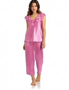 THE LOOKTiers of chiffon ruffles adorn the yoke and cap sleevesV-neck with center chiffon bowSatin bodySatin drawstring waist pajama pantsTHE FITTop: about 25 from shoulder to hemPants: rise, about 10; inseam, about 26THE MATERIALPolyesterCARE & ORIGINMachine washImported THE LOOKTiers of chiffon ruffles adorn the yoke and cap sleevesV-neck with center chiffon bowSatin bodySatin drawstring waist pajama pantsTHE FITTop: about 25 from shoulder to hemPants: rise, about 10; inseam, about 26THE MATERIALPolyesterCARE & ORIGINMachine washImported