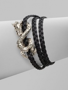 From the Naga Collection. A braid of rich leather wraps the wrist three times while weaving in and out of a curvaceous silver dragon.LeatherSterling silverLength, about 6½Lobster claspMade in Bali From the Naga Collection. A braid of rich leather wraps the wrist three times while weaving in and out of a curvaceous silver dragon.LeatherSterling silverLength, about 6½Lobster claspMade in Bali