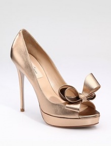 Perfectly placed bow defines this metallic nappa timeless style. Self-covered heel, 5 (125mm) Covered platform, 1¼ (30mm) Compares to a 3¾ (95mm) Nappa upper Leather lining and sole Padded insole Made in ItalyOUR FIT MODEL RECOMMENDS ordering one half size up as this style runs small. Perfectly placed bow defines this metallic nappa timeless style. Self-covered heel, 5 (125mm) Covered platform, 1¼ (30mm) Compares to a 3¾ (95mm) Nappa upper Leather lining and sole Padded insole Made in ItalyOUR FIT MODEL RECOMMENDS ordering one half size up as this style runs small.