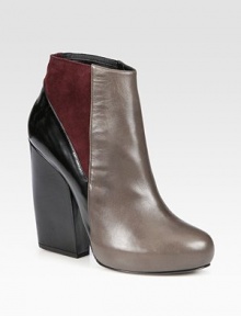 Bands of suede, polished leather and a block heel combine on this trend-worthy platform design. Self-covered leather heel, 4¾ (120mm)Covered platform, ¾ (20mm)Compares to a 4 heel (100mm)Leather and stretch suede upperPull-on styleLeather lining and solePadded insoleMade in Italy Bands of suede, polished leather and a block heel combine on this trend-worthy platform design. Self-covered leather heel, 4¾ (120mm)Covered platform, ¾ (20mm)Compares to a 4 heel (100mm)Leather and stretch suede upperPull-on styleLeather lining and solePadded insoleMade in Italy